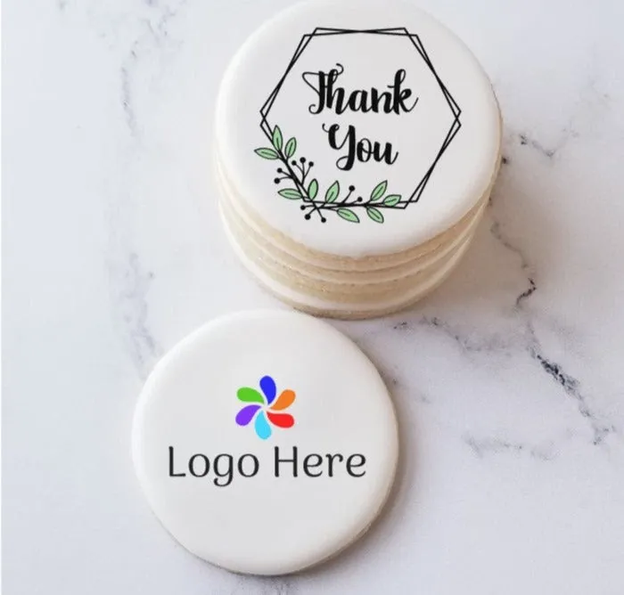 Stacked Thank You sugar cookies beside a demo cookie marked Logo Here - corporate gift capability